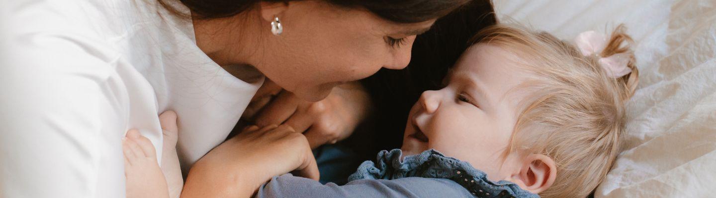 Woman with child born after donor egg treatment at Cryos Clinic